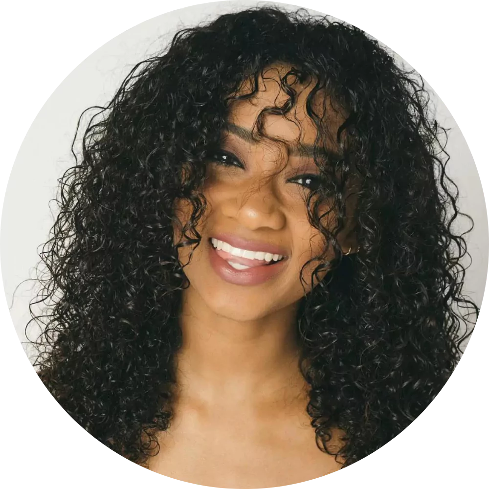 Smiling woman with curly hair